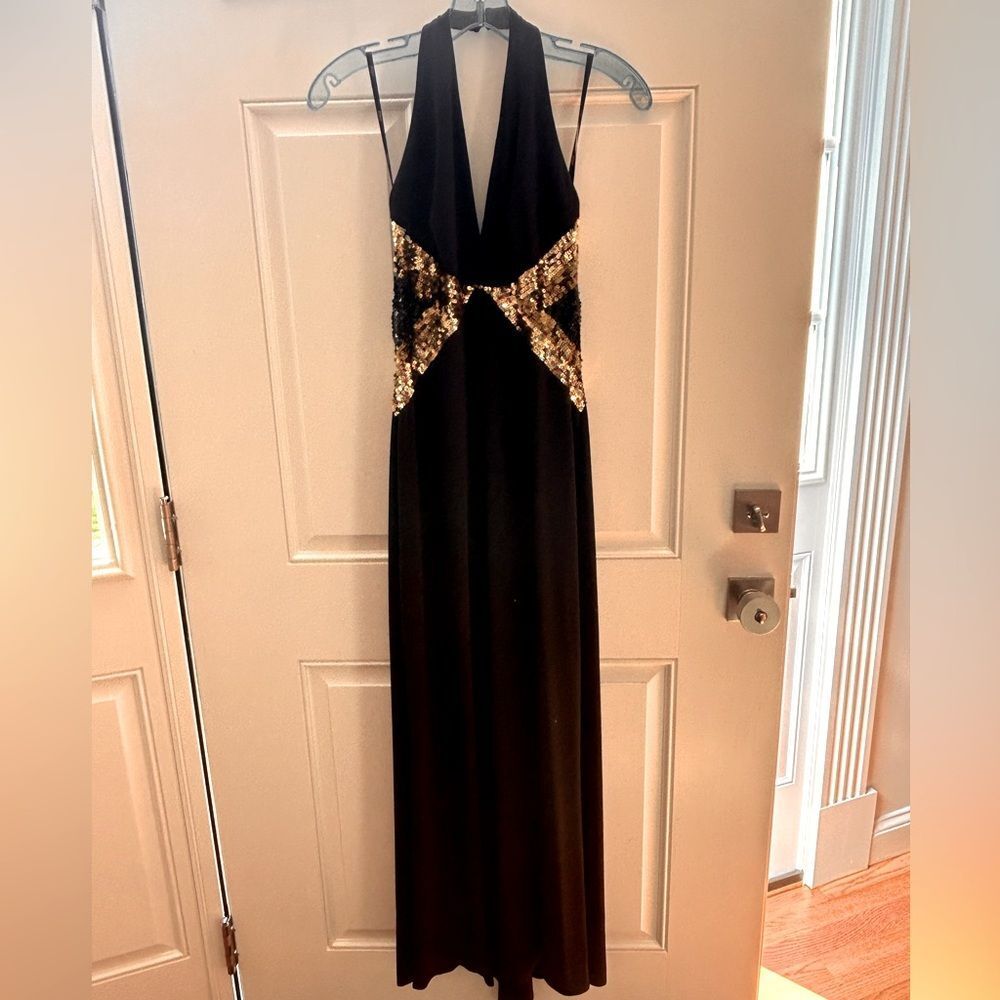 Flip black halter with gold sequin prom dress